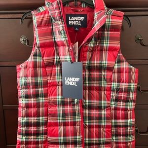 Beautiful Lands End down puffer vest woman’s size S. This was Never worn.
